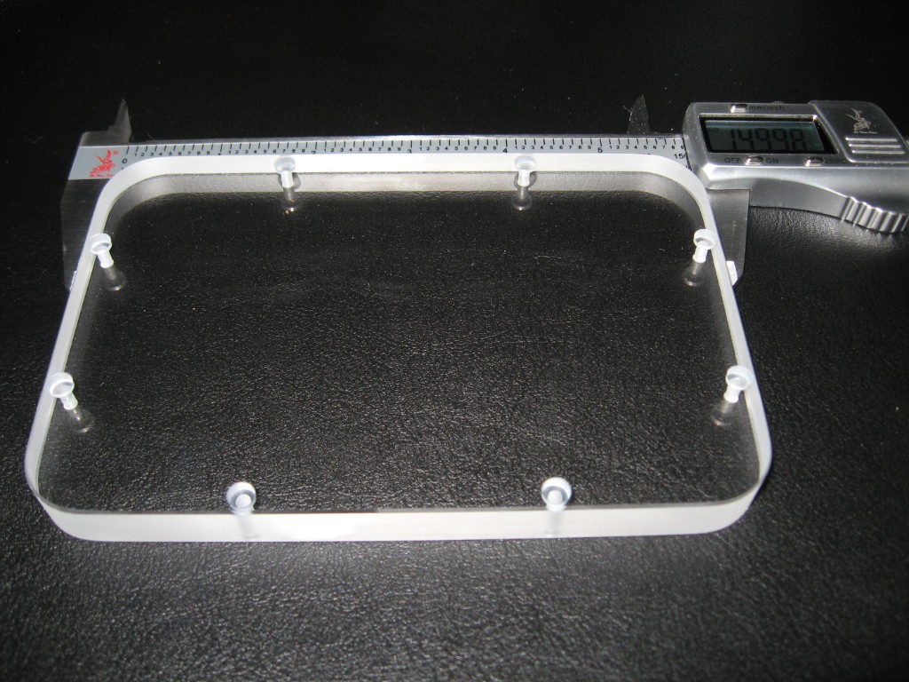 Large fused silica window with mounting holes