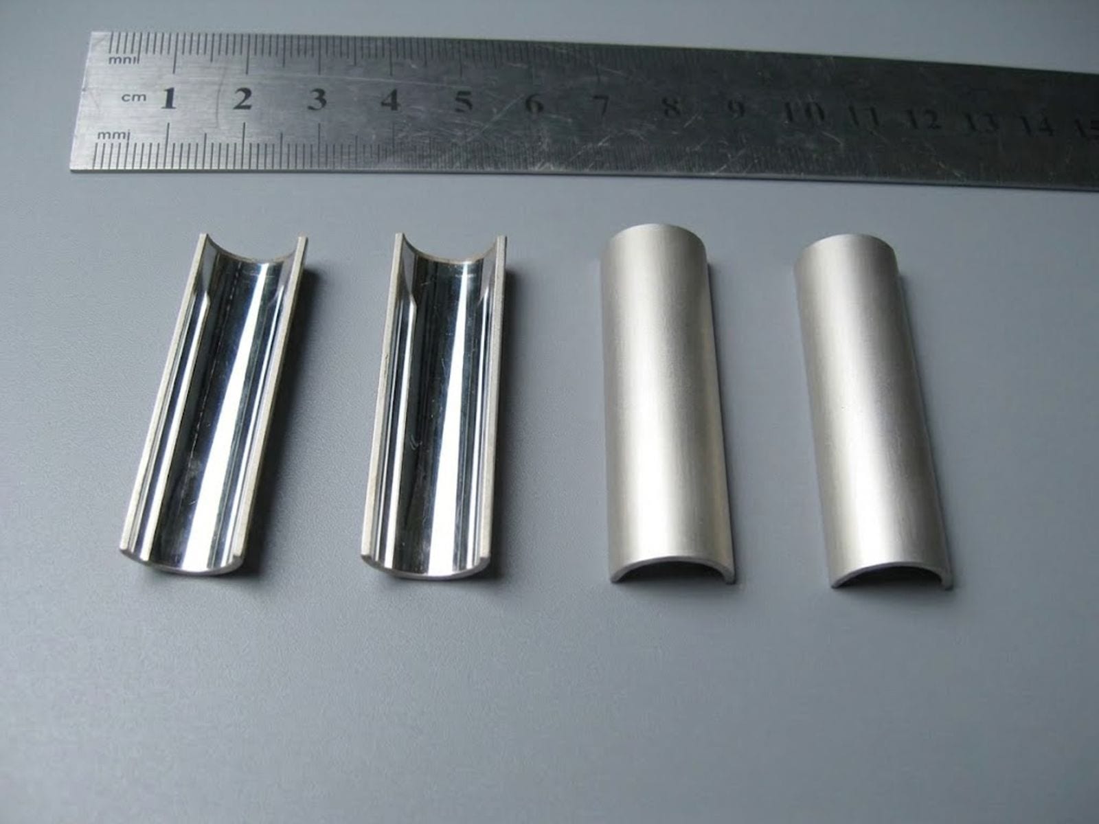 Silver-coated half-cylinder reflectors, inner and outer sides