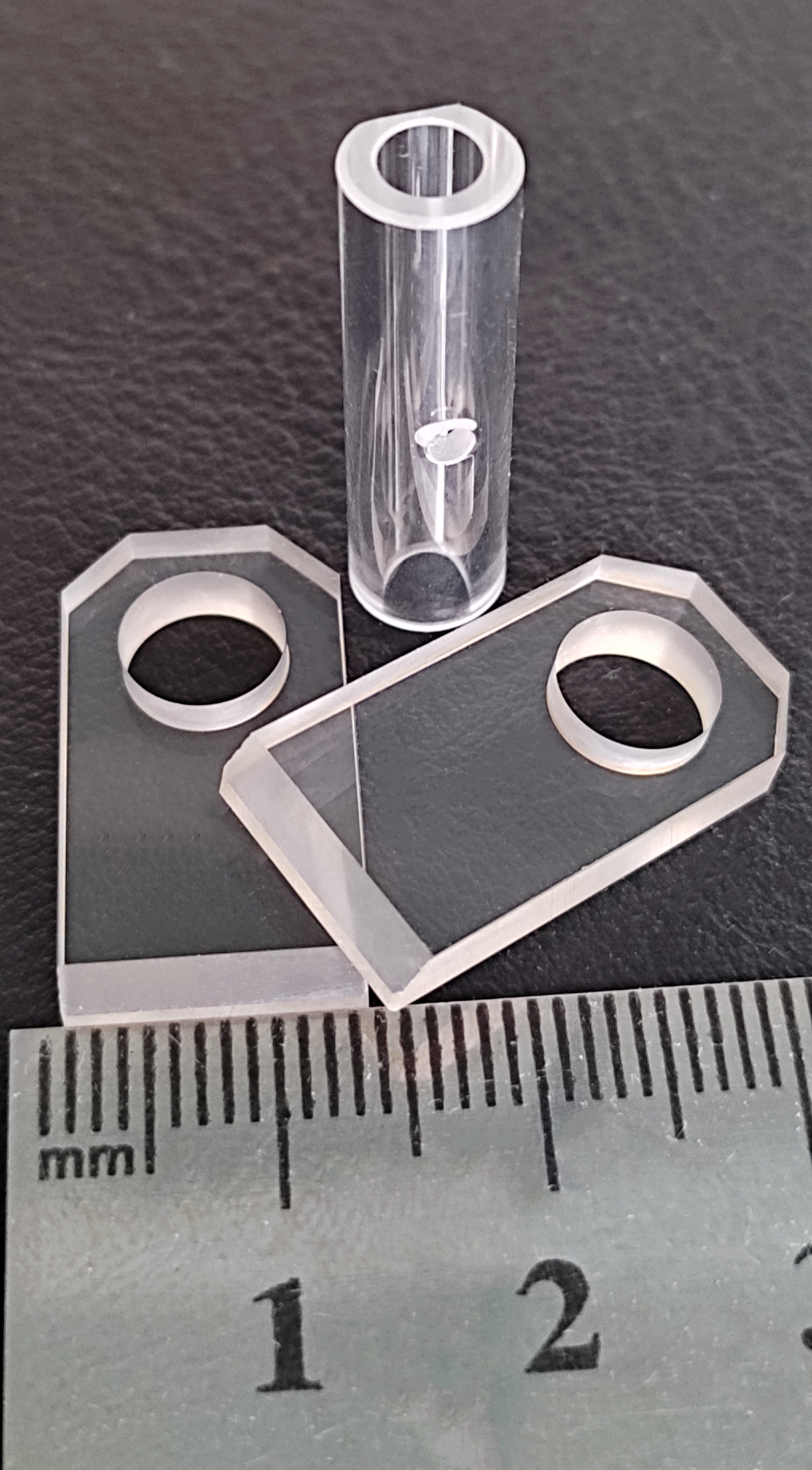 Custom tube blank and two beveled mounting plates with large bored holes