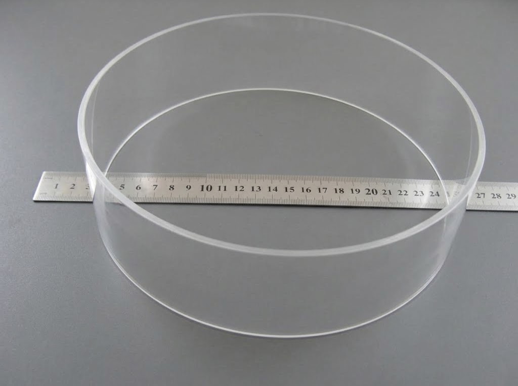 Large-diameter thin-wall polished tube next to a ruler