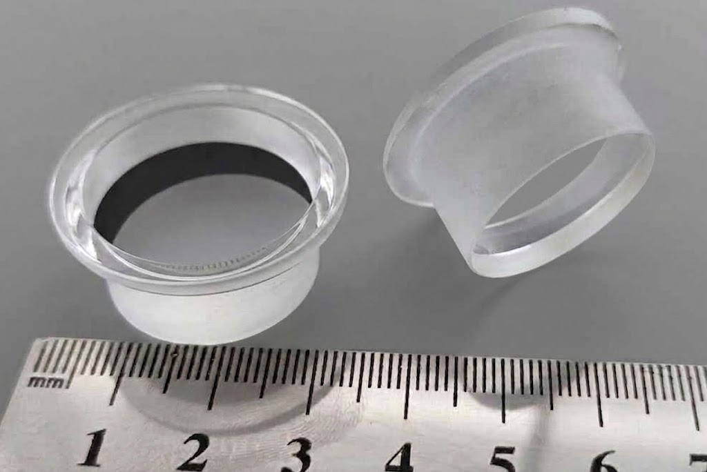 Two stepped window caps next to a ruler